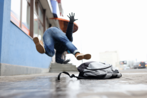 man slipping on the sidewalk in New Haven